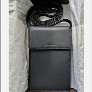 Coach Black Leather Swing Wallet with Flap Closure